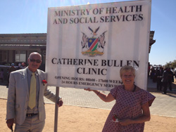 Roger and Linda unveil clinic sign